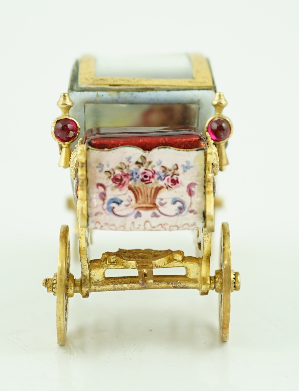 An early 20th century Viennese silver gilt and enamel miniature model of carriage, by Ludwig Pollitzer?